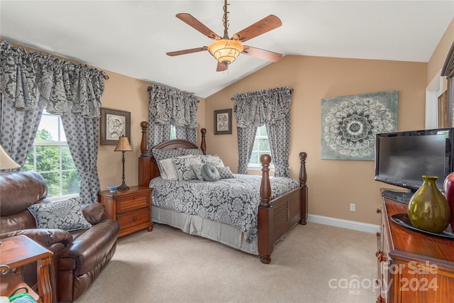 bedroom featuring light carpet, ceiling fan, and vaulted ceiling