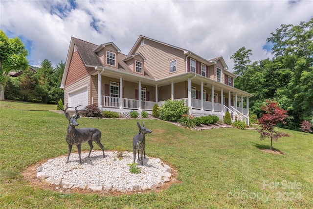 view of front of property with a porch and a front lawn