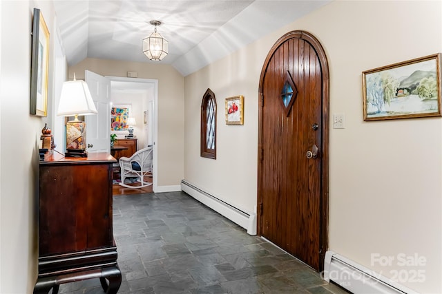 corridor with baseboard heating and vaulted ceiling