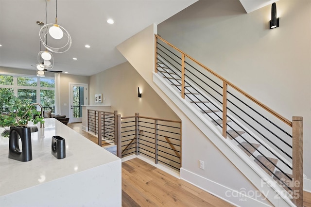 kitchen featuring pendant lighting and light hardwood / wood-style flooring