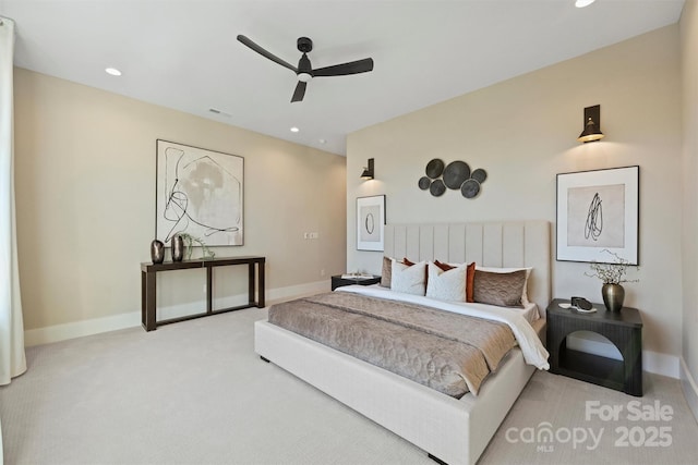 carpeted bedroom with ceiling fan