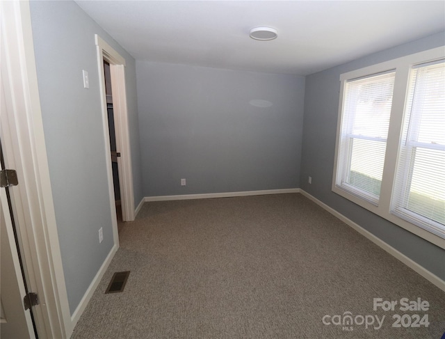 410 Clinton Dr, Kings Mountain, NC 28086 - unfurnished room featuring visible vents, baseboards, and carpet floors