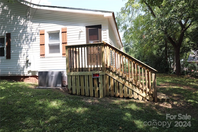 410 Clinton Dr, Kings Mountain, NC 28086 - exterior space featuring a yard, stairway, central AC, and a wooden deck