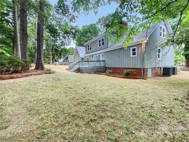 view of yard with a wooden deck