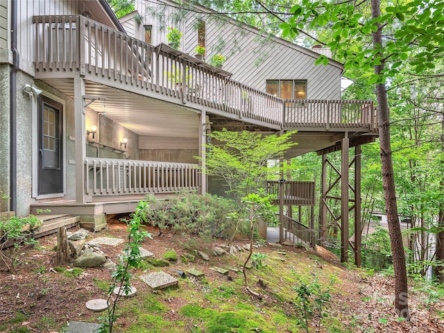 view of property exterior featuring a deck