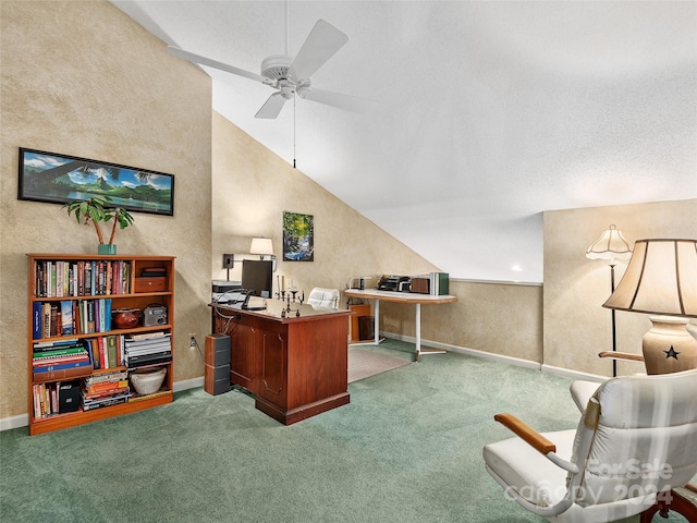 office area with ceiling fan, carpet floors, and vaulted ceiling