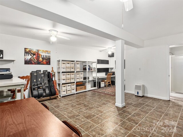 living room featuring ceiling fan