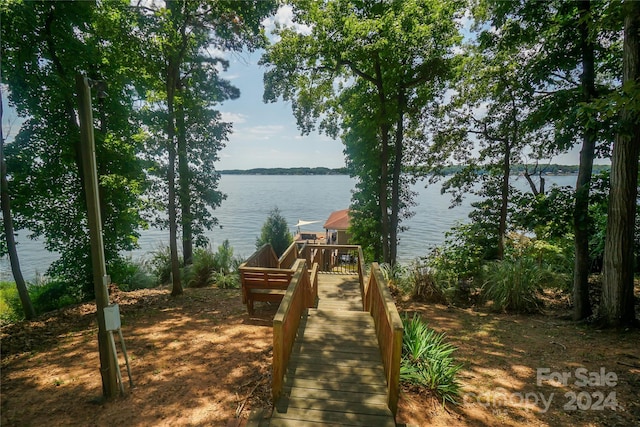 dock area featuring a water view