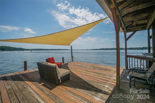 dock area featuring a water view