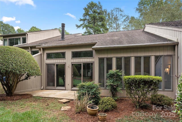 back of house featuring a patio