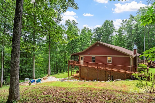 view of home's exterior with a deck