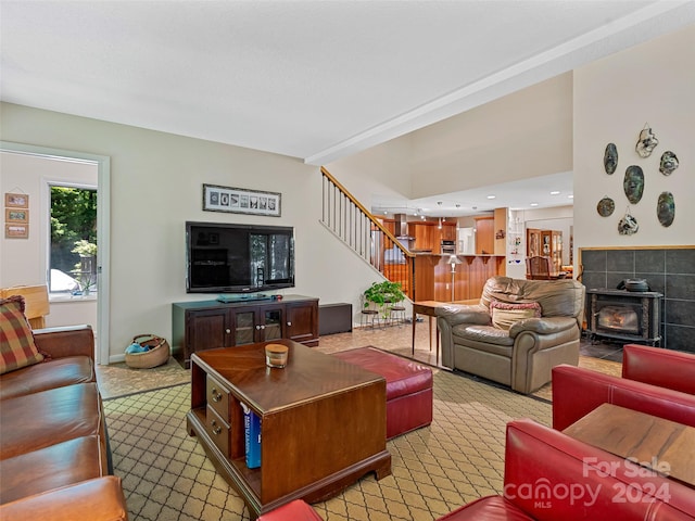 living room featuring a wood stove