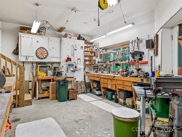 garage featuring a workshop area