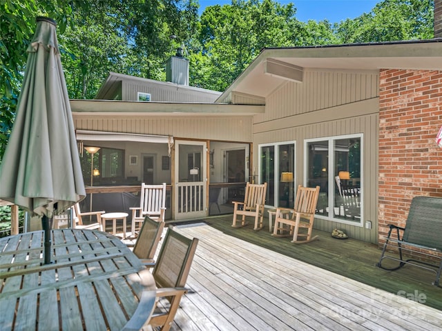 deck featuring a sunroom