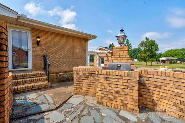 view of patio / terrace with a grill