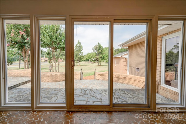 doorway to outside with a healthy amount of sunlight