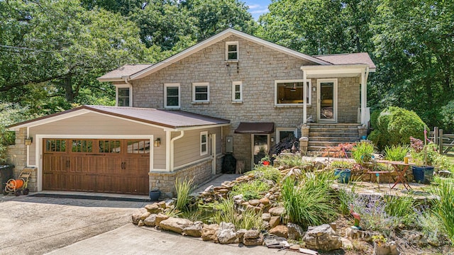 view of front of home with a garage