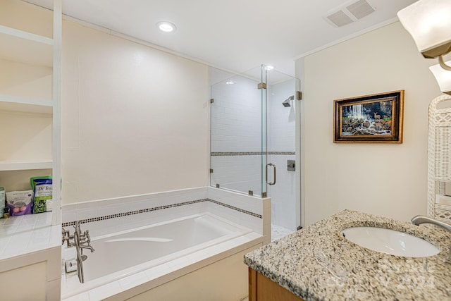 bathroom featuring vanity and plus walk in shower