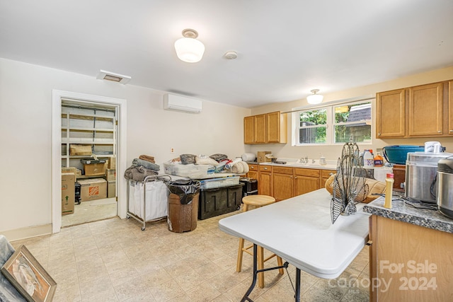 kitchen featuring a wall mounted AC