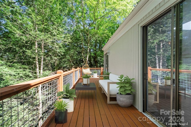 deck featuring an outdoor living space