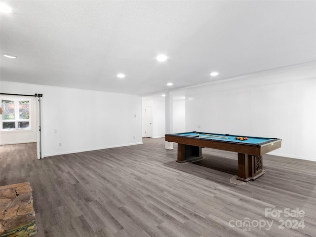 recreation room with pool table and hardwood / wood-style floors