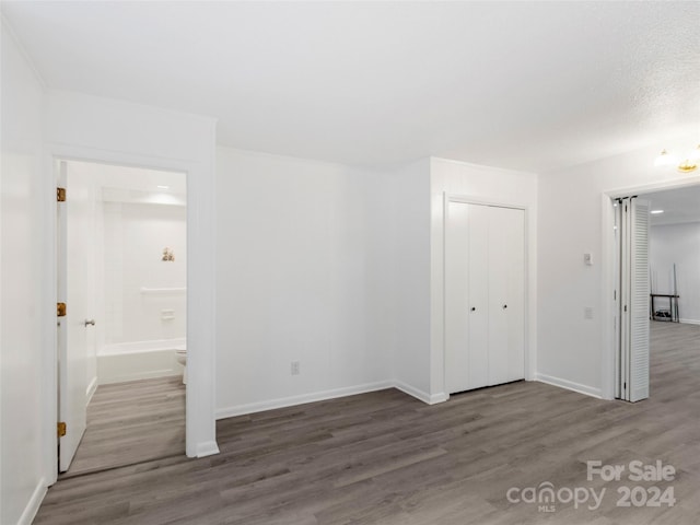 empty room featuring hardwood / wood-style flooring