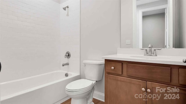 full bathroom featuring vanity,  shower combination, and toilet