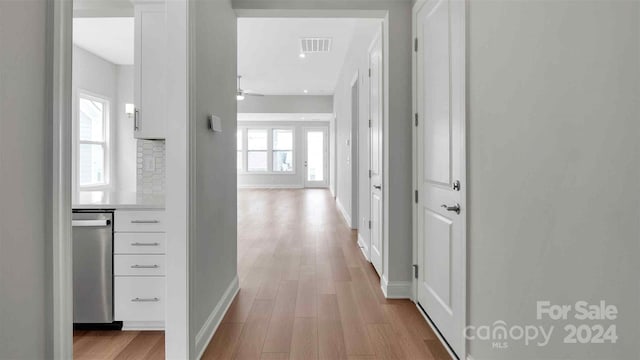 corridor featuring light hardwood / wood-style flooring