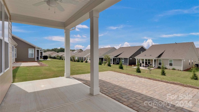 view of patio / terrace featuring ceiling fan