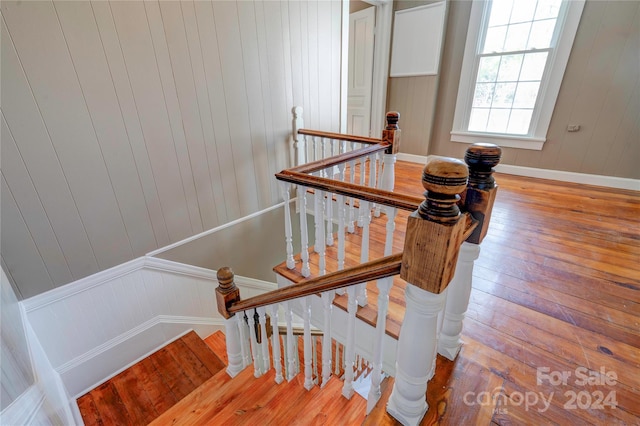 staircase featuring hardwood / wood-style floors