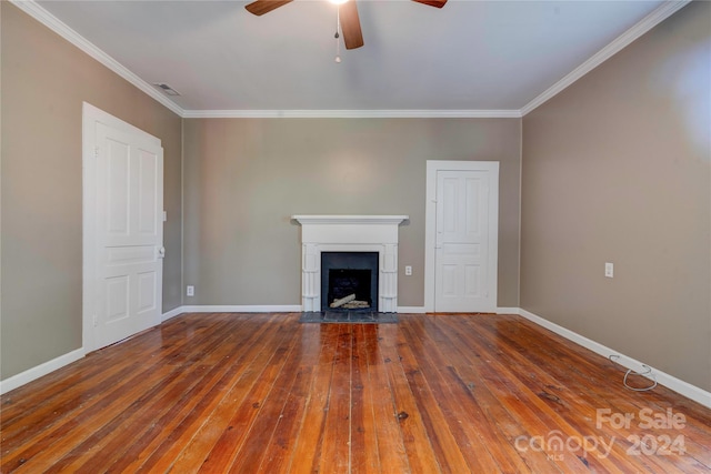 unfurnished living room featuring ceiling fan, ornamental molding, and hardwood / wood-style floors