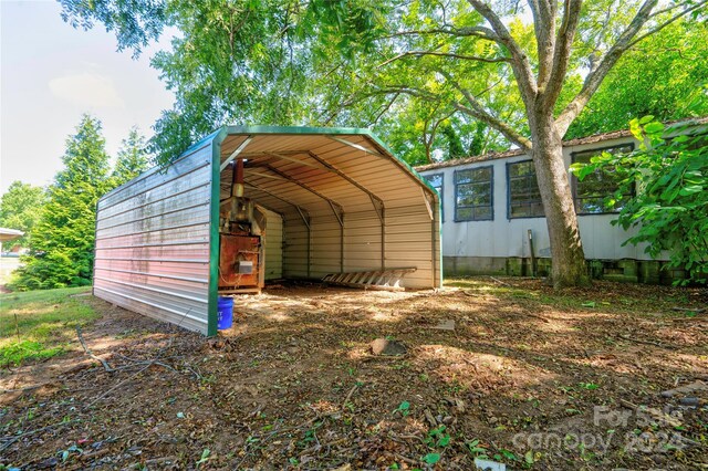 view of outdoor structure with a carport