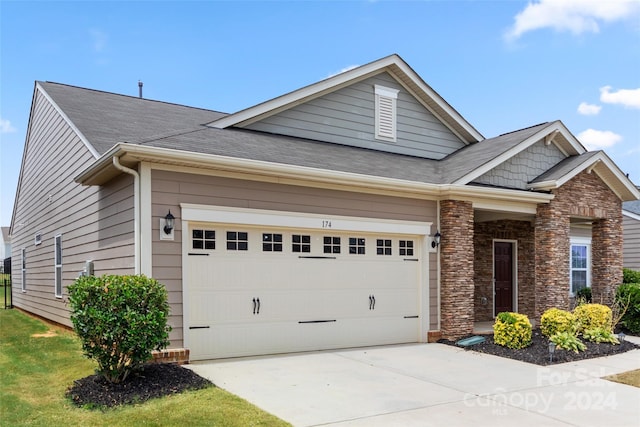 craftsman-style home featuring a garage