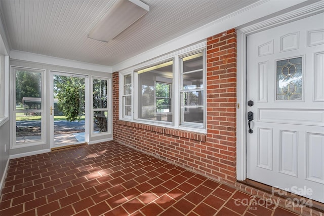 view of unfurnished sunroom