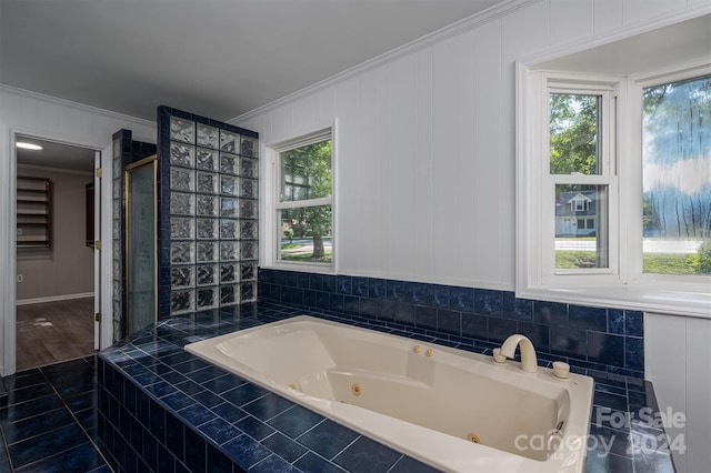 bathroom featuring tile patterned floors, crown molding, plenty of natural light, and shower with separate bathtub