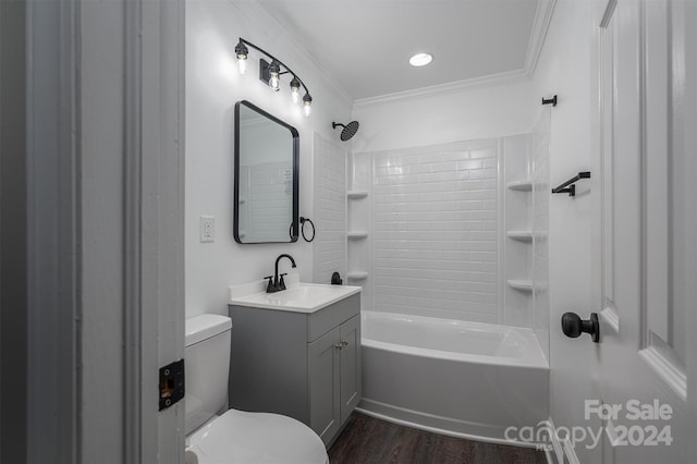 full bathroom featuring hardwood / wood-style floors, vanity, toilet, ornamental molding, and shower / bathtub combination