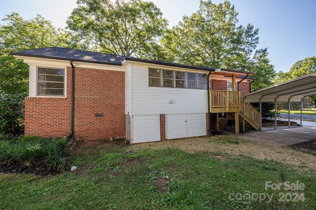 view of outdoor structure with a carport