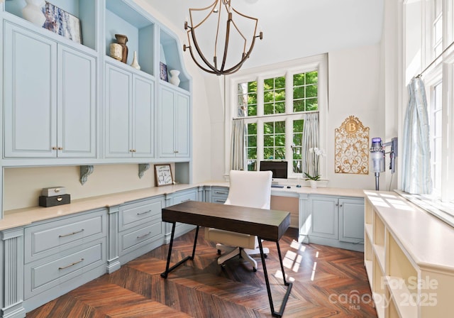 office area featuring dark parquet flooring