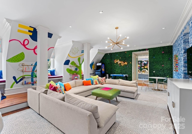 living room featuring an inviting chandelier and crown molding