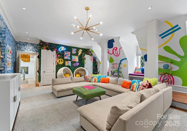 living room featuring a notable chandelier and ornamental molding