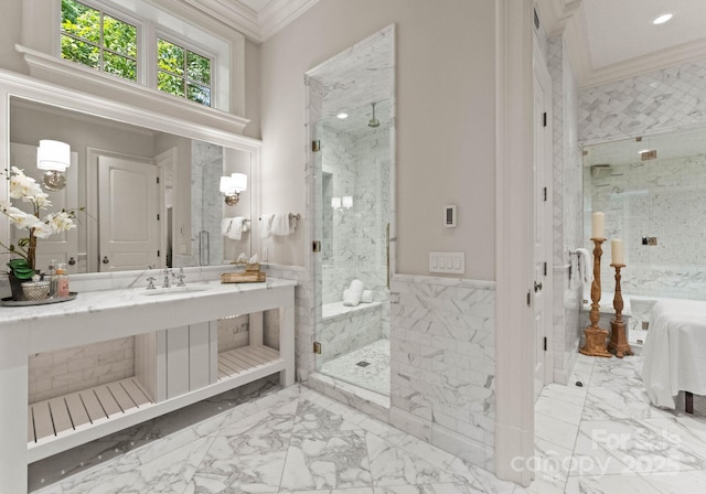 bathroom featuring crown molding, sink, tile walls, and walk in shower