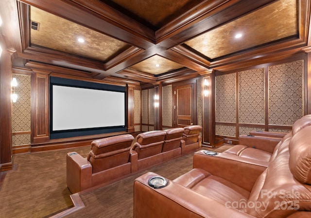 cinema room featuring crown molding, beamed ceiling, coffered ceiling, and dark colored carpet