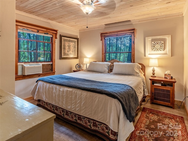 bedroom featuring wooden ceiling, cooling unit, and ornamental molding