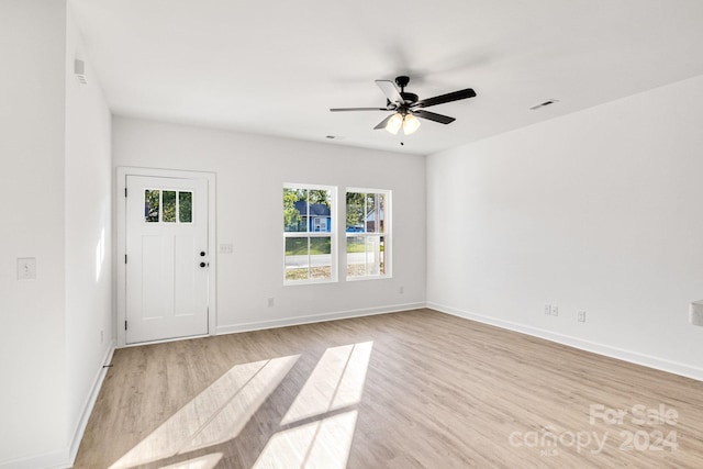 interior space with ceiling fan, light hardwood / wood-style flooring, and a healthy amount of sunlight