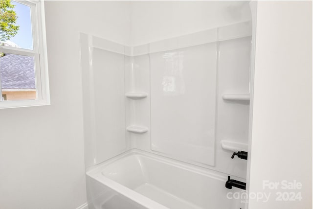 bathroom with shower / bathing tub combination