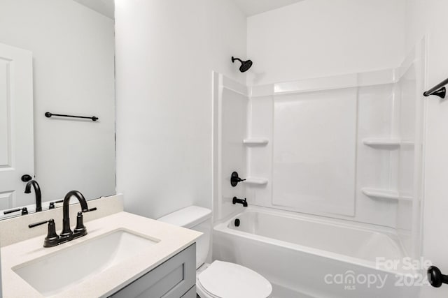 full bathroom featuring vanity, shower / bathing tub combination, and toilet