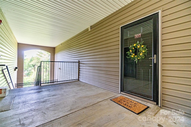 doorway to property with a porch