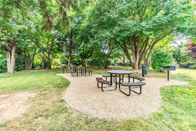 view of home's community with a lawn