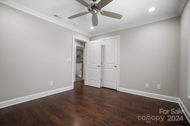 unfurnished bedroom with ceiling fan, dark hardwood / wood-style flooring, and ornamental molding