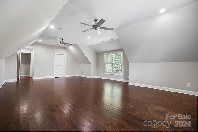 bonus room featuring ceiling fan, dark hardwood / wood-style flooring, and vaulted ceiling